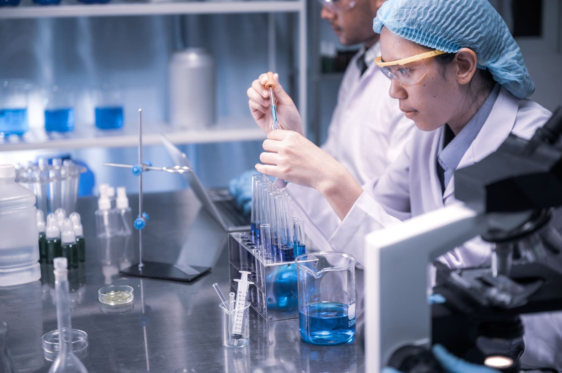 Human health — researcher with test tubes in laboratory